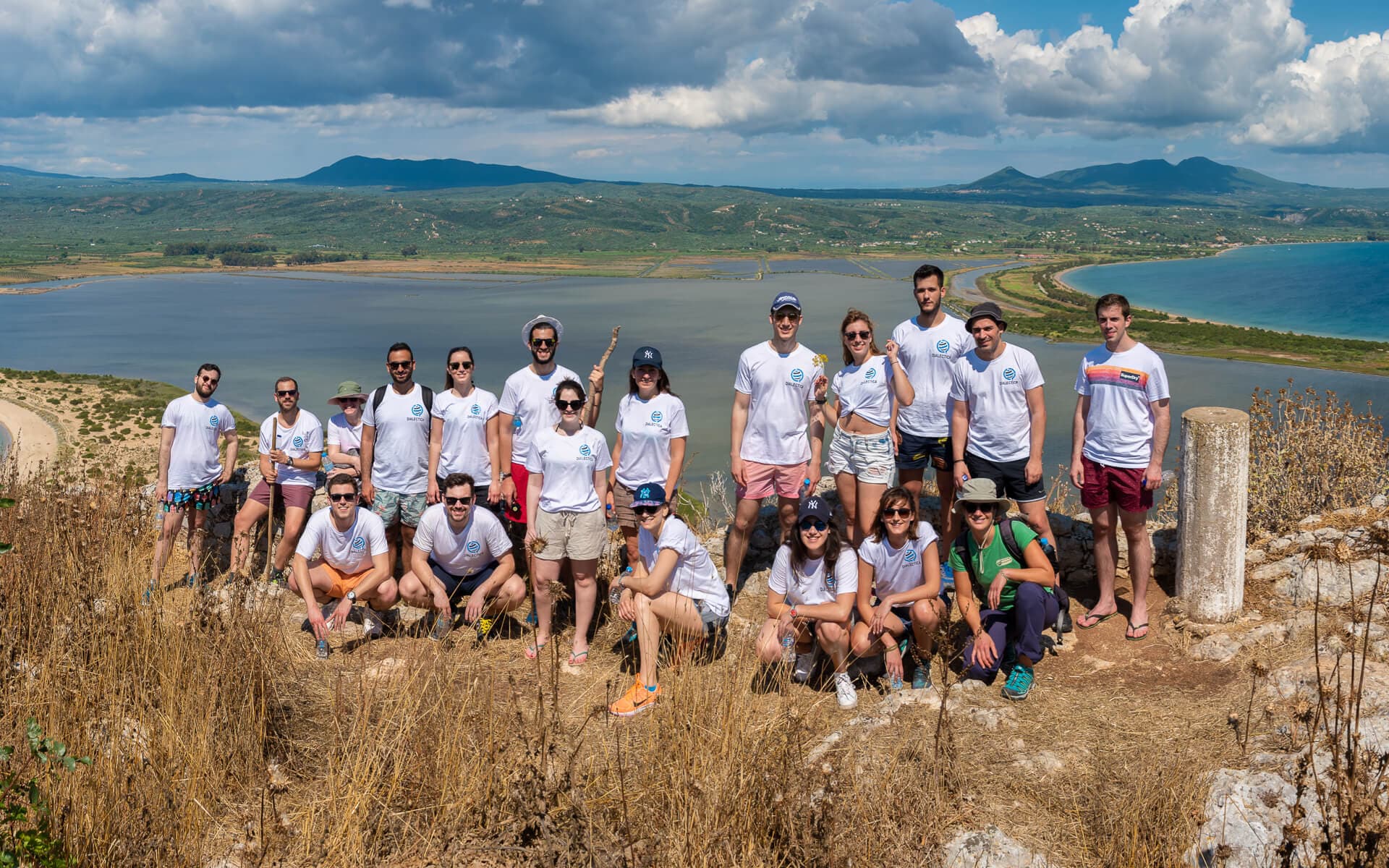 Students on a school trip enjoying a panoramic view of the Gialova Lagoon.