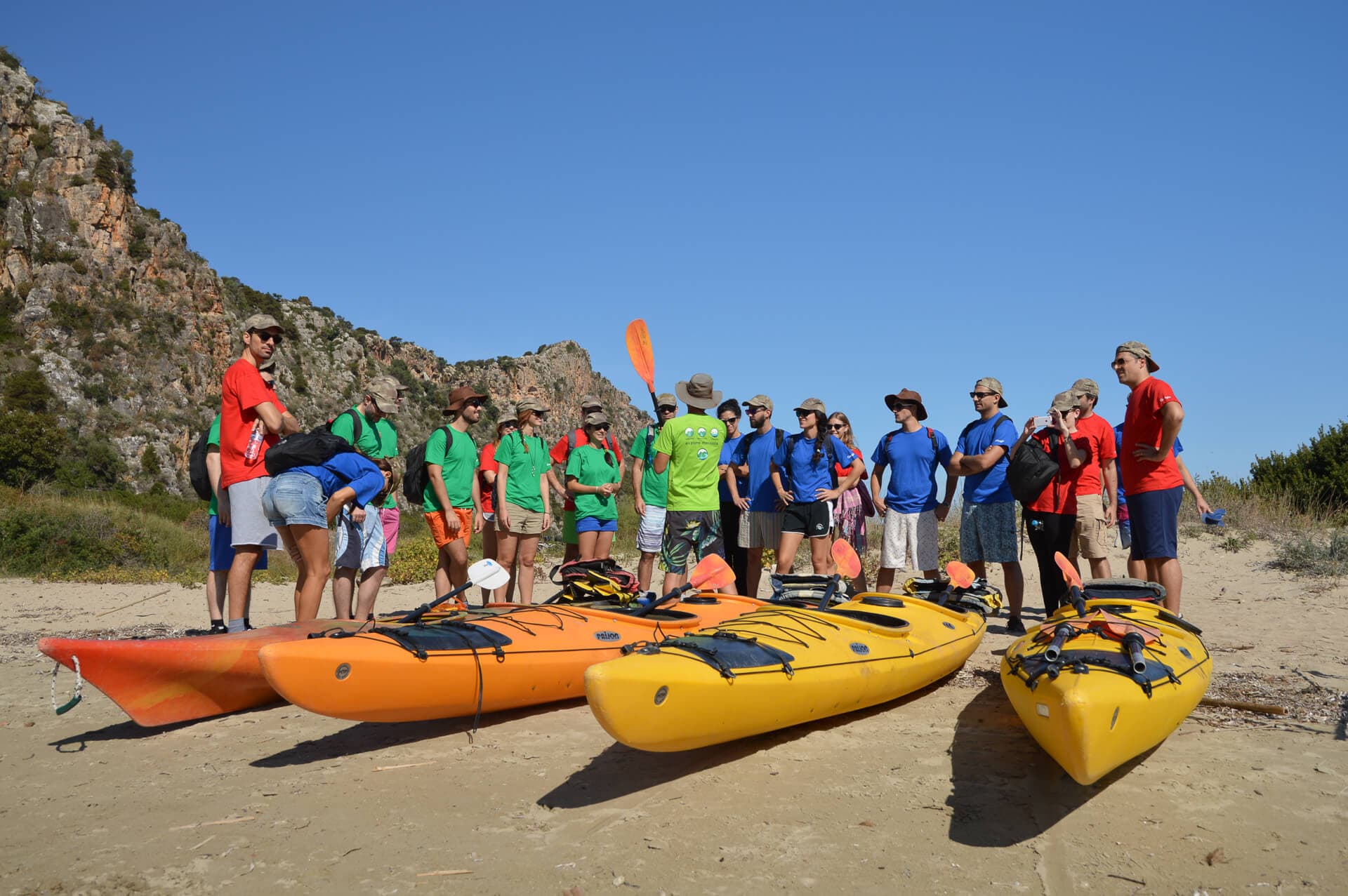 Instructors providing safety training during an outdoor educational student journey.