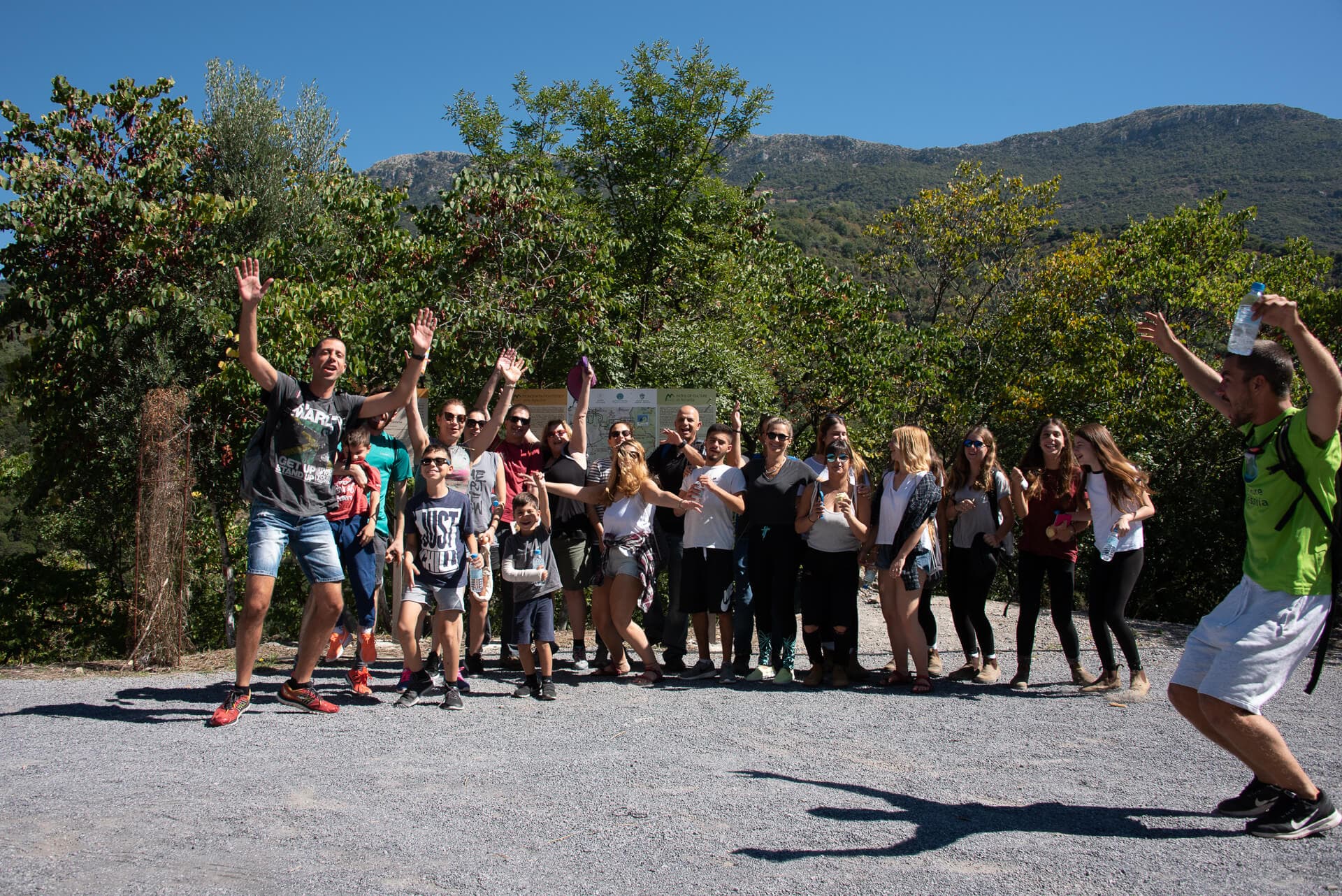 A happy group of students and teachers on an outdoor educational adventure.