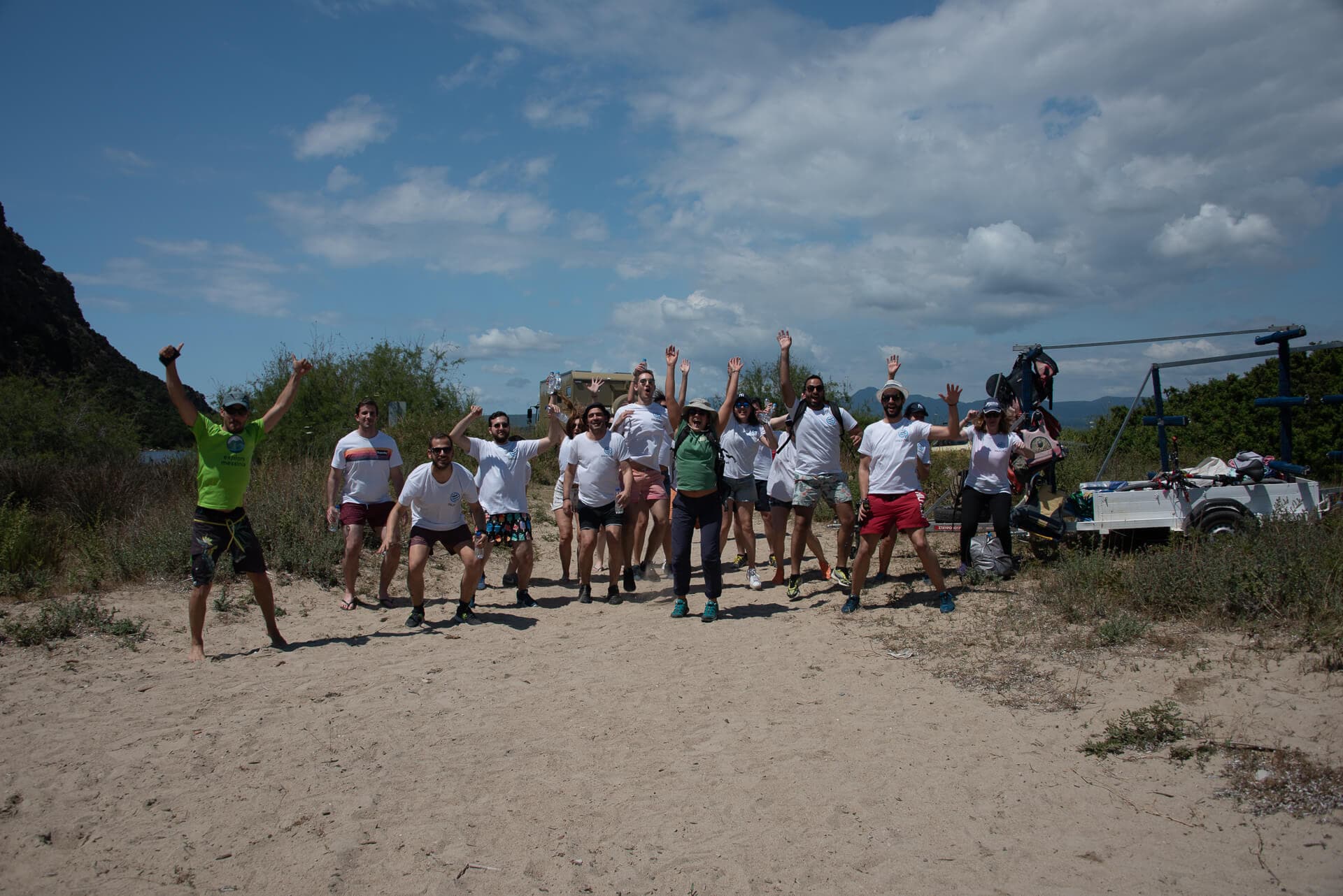 A large group of students posing after an outdoor educational tour with Explore Messinia.
