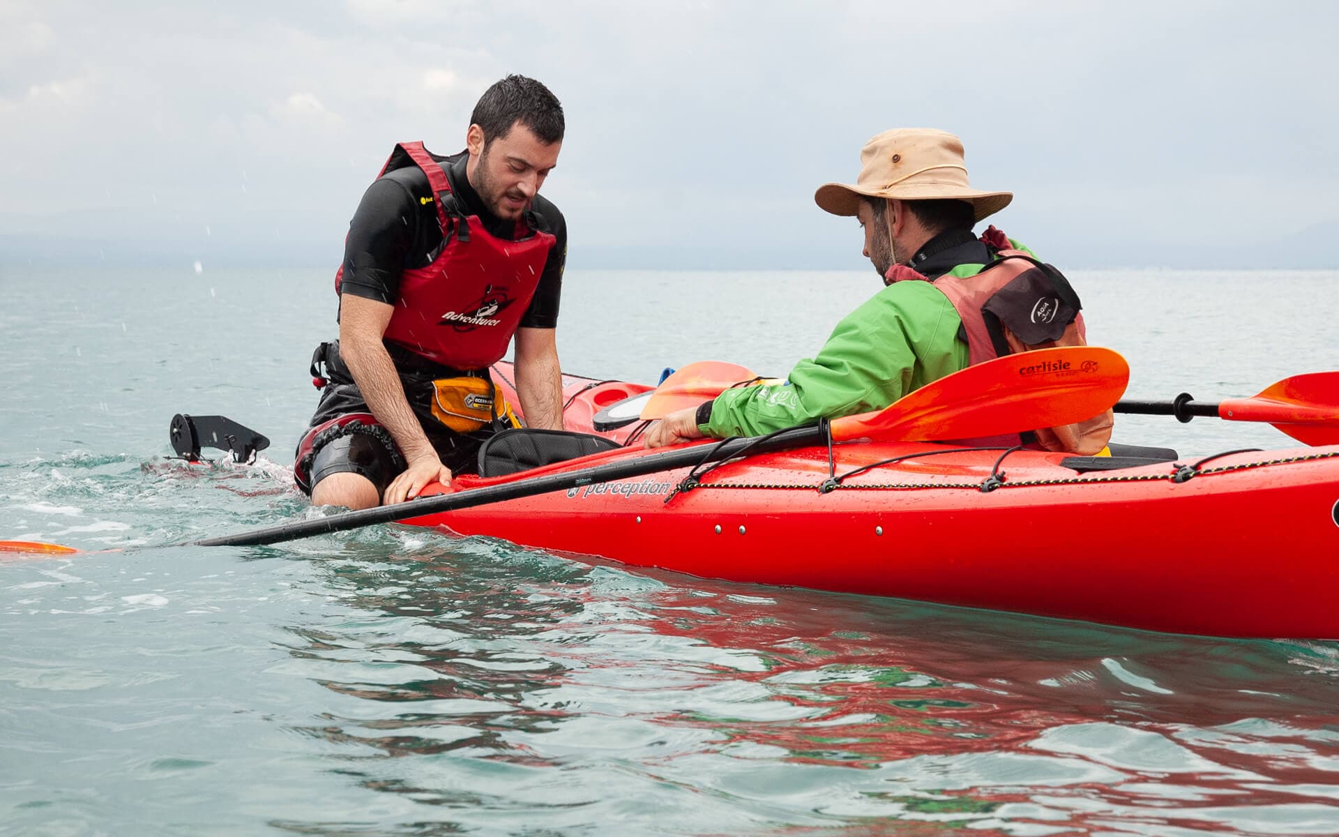 Explore Messinia instructor providing direct feedback to a student during Outdoor Sea Kayak Training.