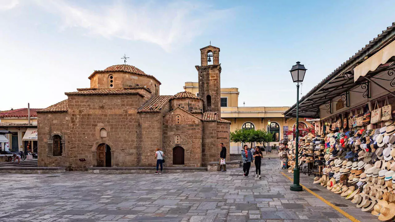 Explore Messinia-Kalamata’s charming old town featuring the Saint Apostoles church, surrounded by small local shops, a must-visit spot for history and culture enthusiasts.