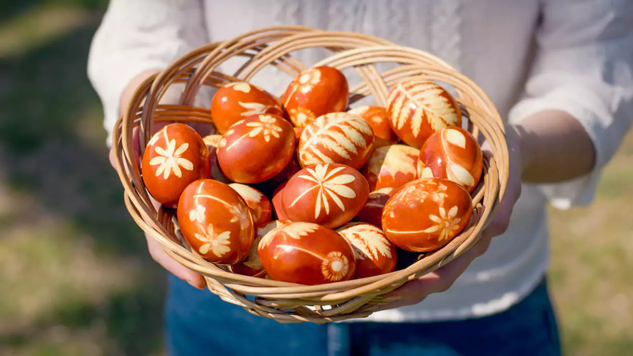 Explore Messinia-A close-up of vividly dyed red Easter eggs, symbolizing renewal and the blood of Christ, a staple of Greek Easter traditions in the Peloponnese.